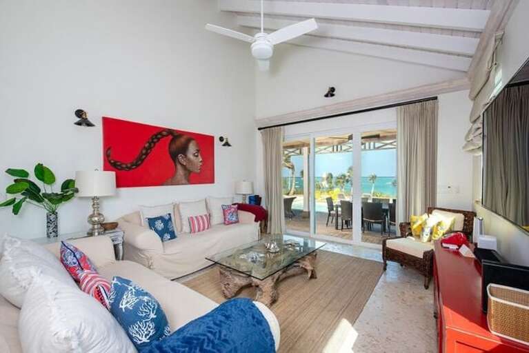 Ocean-view great room opens onto a stunning Brazilian hardwood deck with pool beyond.