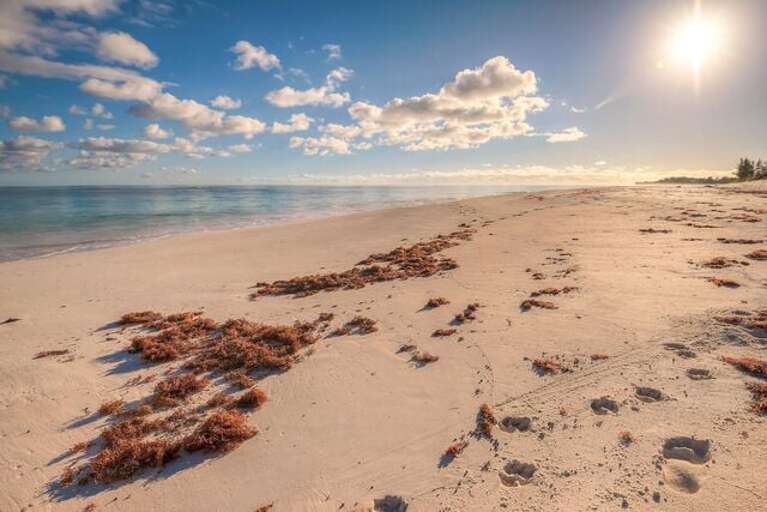 Situated directly on a mile-long, pristine beach that is usually deserted.