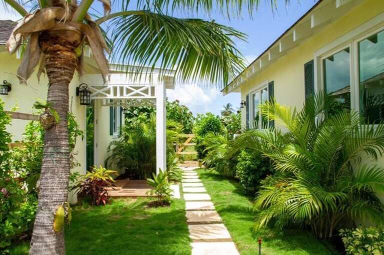Wild Orchid Main House at right and guest cottage at left.