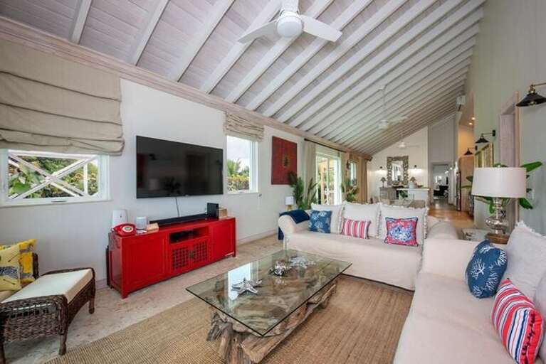 Great Room with coral stone floors and ocean views