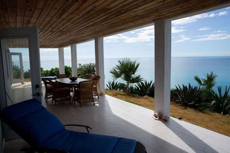 Covered lower level veranda with spectacular views