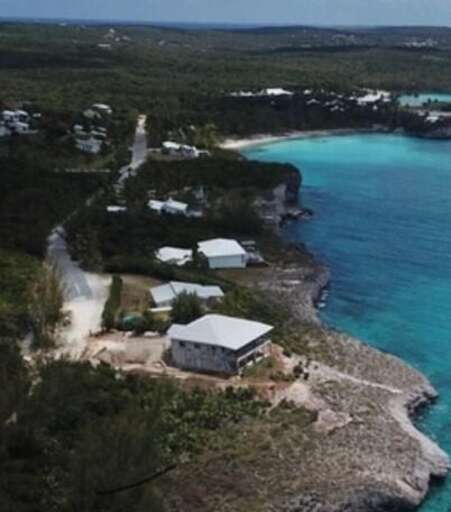 Located in the private community of Oleander Gardens