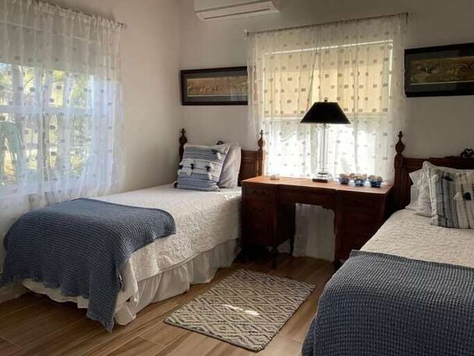 Upper Level Kids bedroom with two twin beds with ocean views, twin beds can be converted to a king