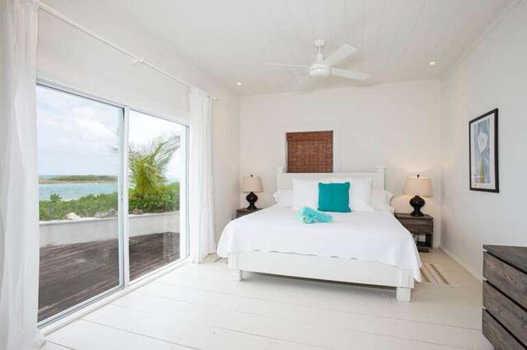 Bedroom with king size bed and ocean views