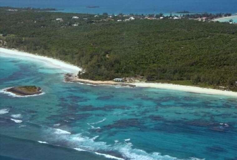 Med Point House aerial view w/Club Med beach on left & Casuarina Beach on right.  There is one house behind (across the road) from Med Point.