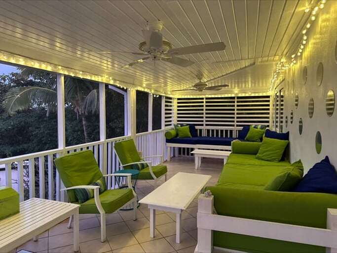 Lounge area of our wonderful screen porch. Lounge area of our wonderful screen porch.