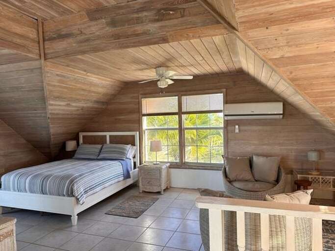 The entire upstairs is one enormous bedroom with two queen beds and a single bed The entire upstairs is one enormous bedroom with two queen beds and a single bed