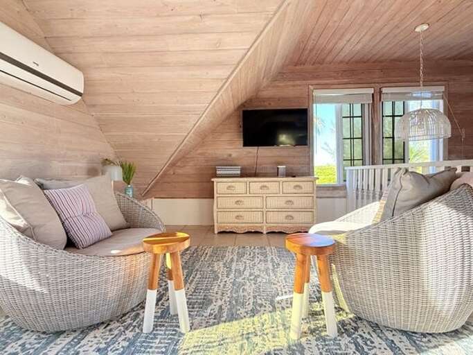 Upstairs bedroom entertainment area