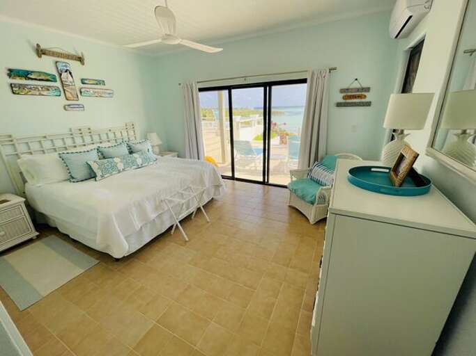 First-floor bedroom have king beds, breathtaking ocean views, full en-suite baths and has a private patio facing the water.