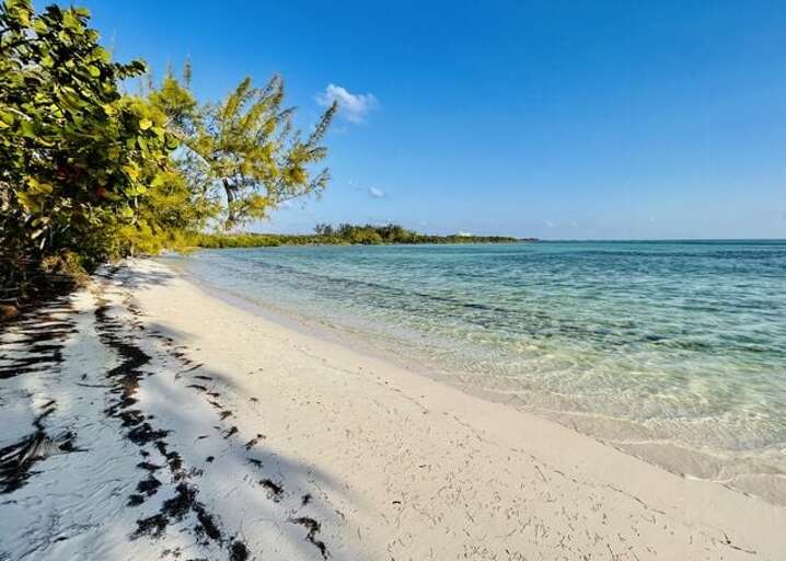 This protected beach is perfect for swimming, snorkeling, kayaking, and paddleboarding