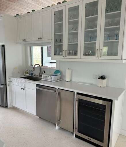 ully equipped kitchen with refrigerator/freezer, gas range and oven, dishwasher, and microwave.