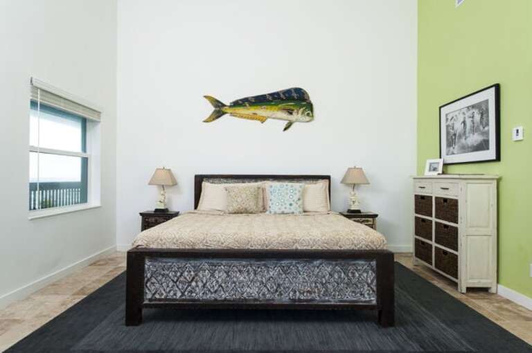 Master king bedroom with private bath at Sunset Villa