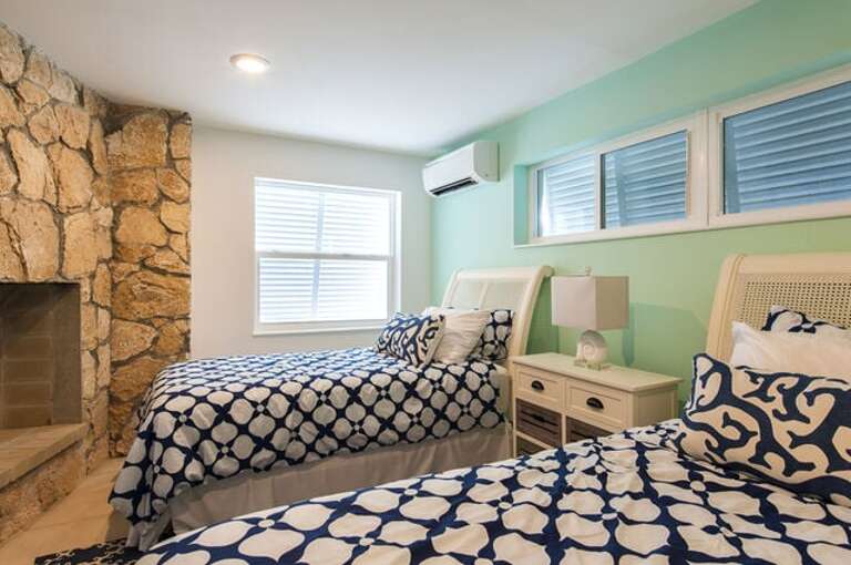 Sunrise Villa's second bedroom has two single beds