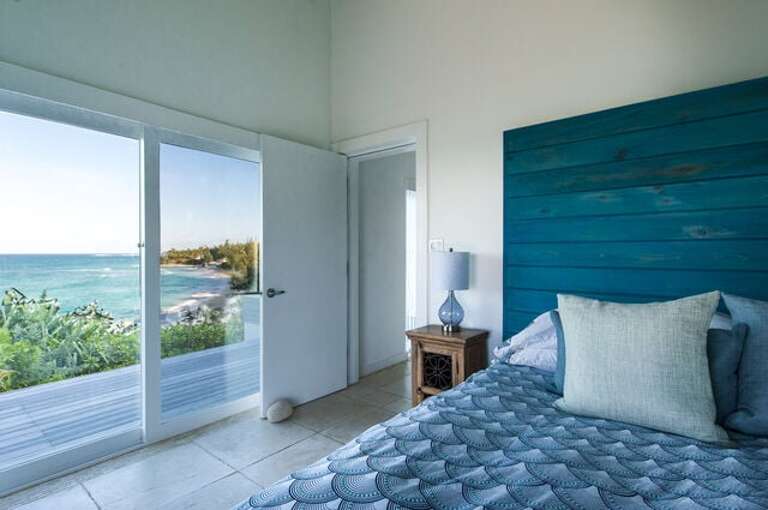 Sunrise Villa's Master Bedroom has king bed with ocean views