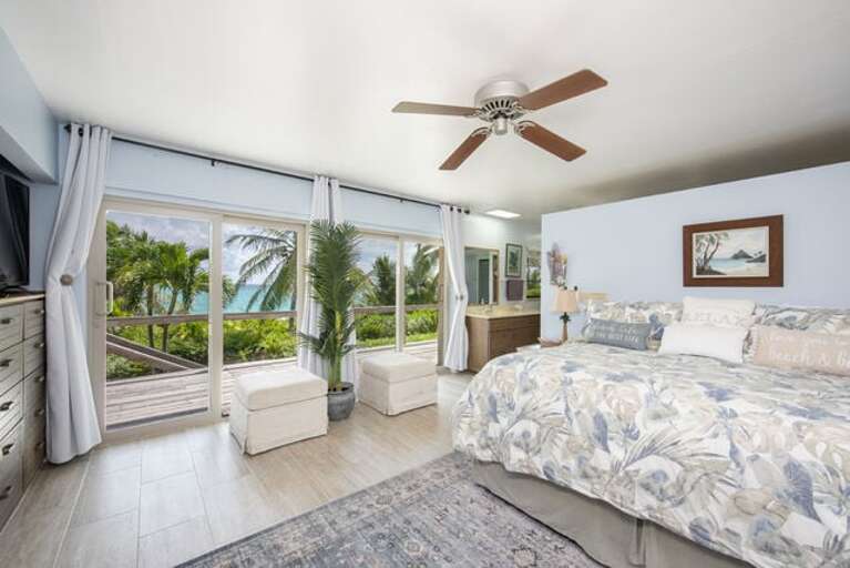 One wing of the house is occupied entirely by the enormous master suite, which features a king bed and an ocean view.