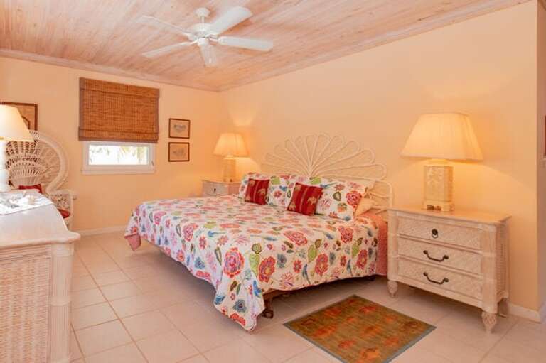 Master suite has a king size bed, walk-in closet and private bath with a pocket door separating the sink/vanity area and the toilet and shower. Master suite has a king size bed, walk-in closet and private bath with a pocket door separating the sink/vanity area and the toilet and shower.