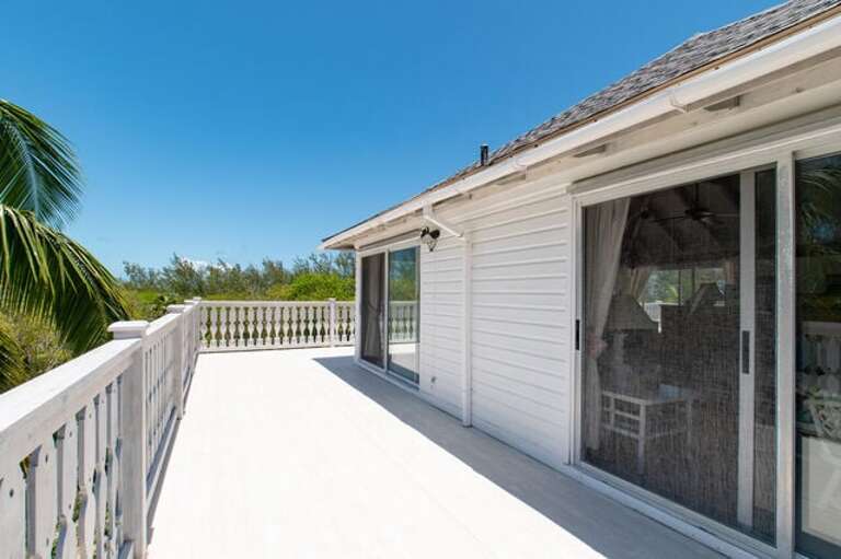 Spacious deck encircling the entire upstairs Spacious deck encircling the entire upstairs