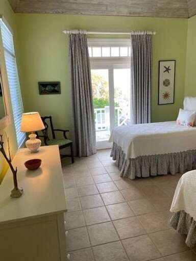 First guest bedroom has two X-Long twin beds, en suite bath with two sinks, large walk-in shower, hair dryer. First guest bedroom has two X-Long twin beds, en suite bath with two sinks, large walk-in shower, hair dryer.