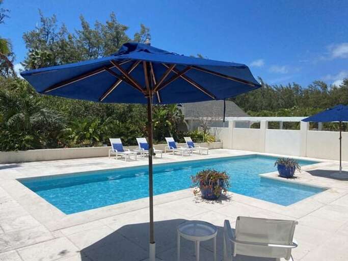 Pool and deck with lounge chairs and shade Pool and deck with lounge chairs and shade