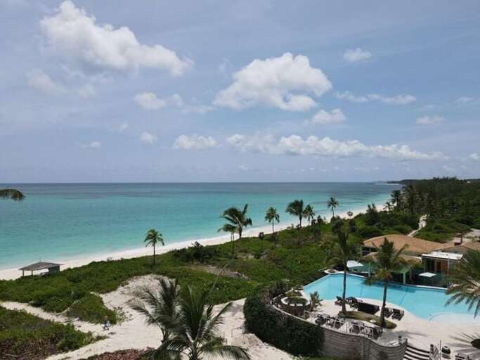 View of Sky Beach Club restaurant, pool and beach.