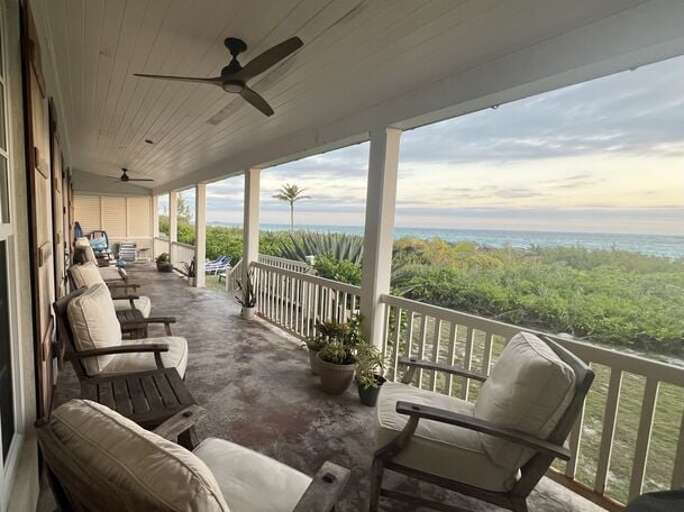 Enjoy the view under the covered veranda.