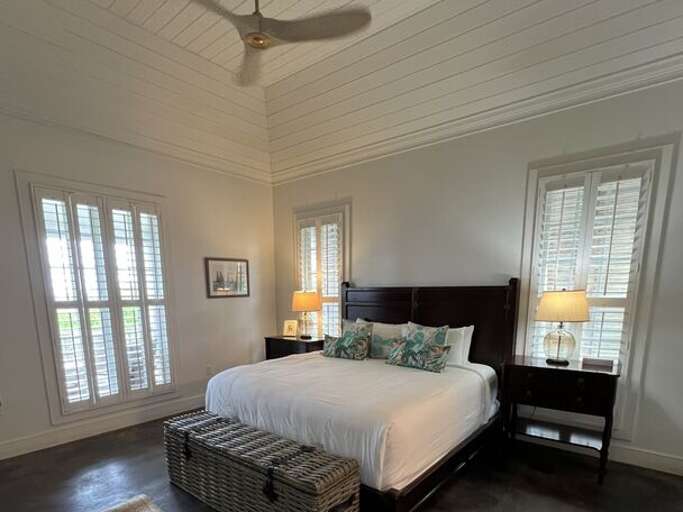 First ocean-view master bedroom with king bed and en suite bath