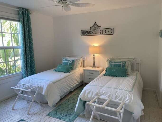 The guest bedroom, which also has an en-suite bath, has twin beds which can be converted to a king upon request.