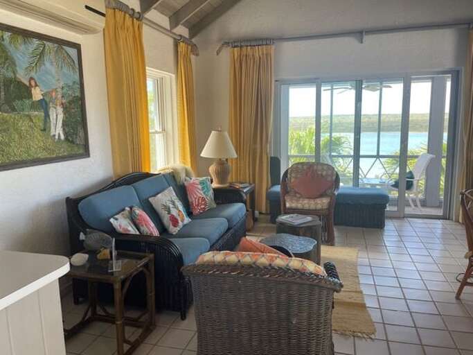 Open concept great room with sweeping views of the Savannah Sound.