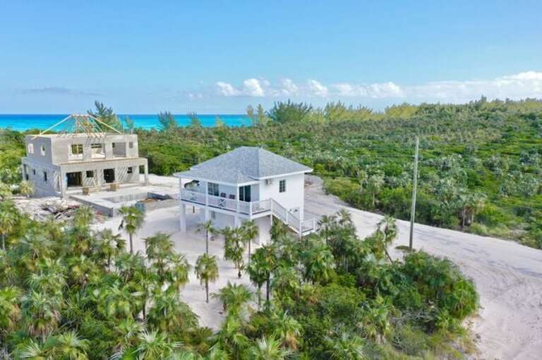 Simple Life Cottage.  Construction on the house to the left is now complete.