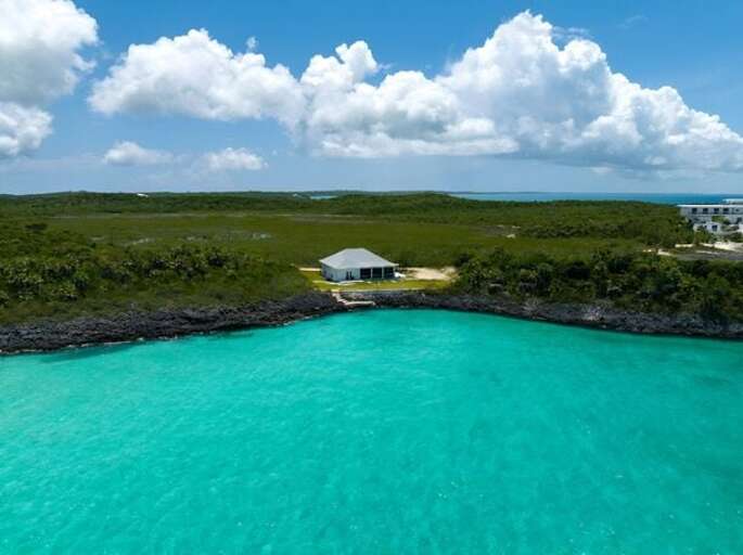 Luxury home on a
secluded Caribbean cove. Luxury home on a
secluded Caribbean cove.
