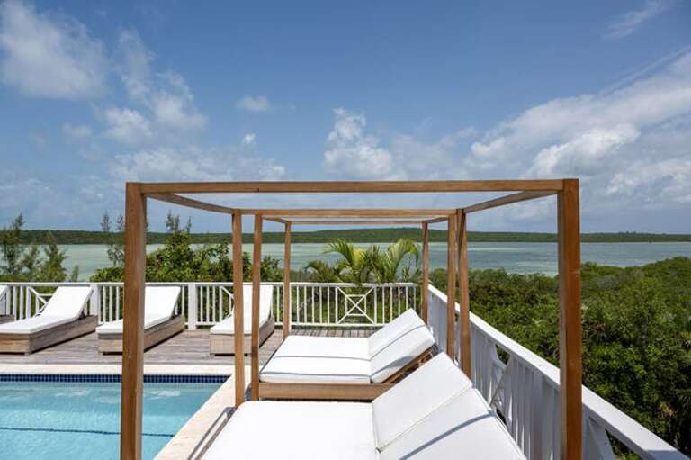 Relax in the plush European-styled poolside lounge chairs.