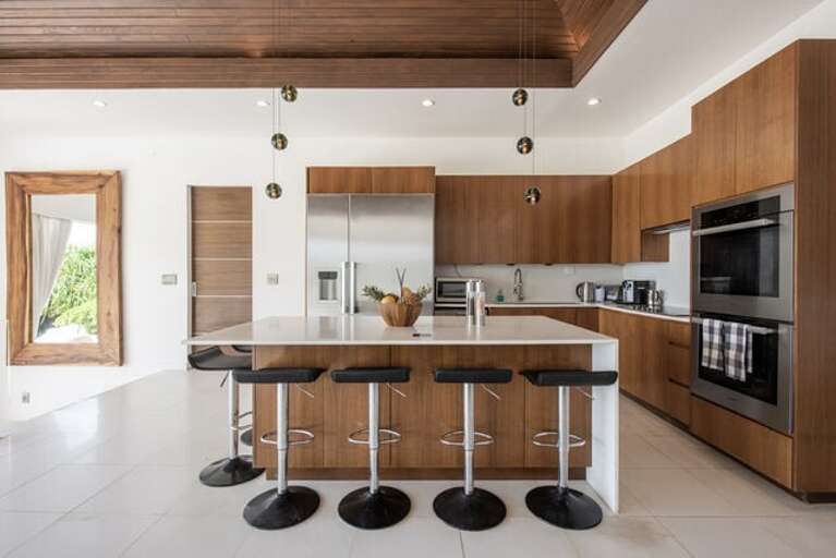 The kitchen is fully equipped with professional grade juicer, blender, Nespresso coffee machine, hotel grade cutlery, and dining ware by Fortessa.