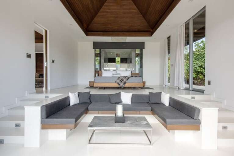 The main house bedrooms each include a lower built-in area for lounging or for use as additional sleeping quarters.