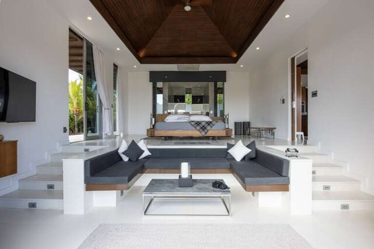 The main house bedrooms each include a lower built-in area for lounging or for use as additional sleeping quarters.