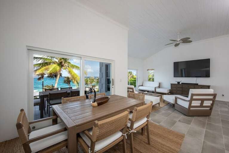 Completely remodeled home sits directly on stunning Double Bay Beach. Completely remodeled home sits directly on stunning Double Bay Beach.