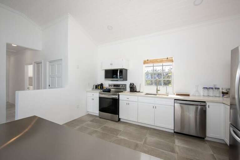 Well equipped kitchen with stainless steel appliances.
