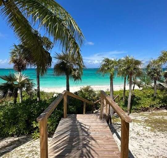 Walk down new stairs to shaded beachfront seating, just steps from the ocean.