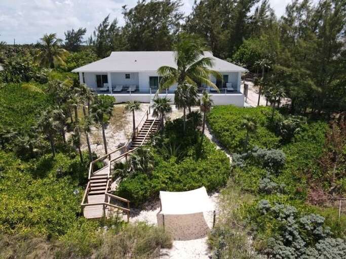 Welcome to Wally Love! This completely remodeled home sits directly on stunning Double Bay Beach. Welcome to Wally Love! This completely remodeled home sits directly on stunning Double Bay Beach.