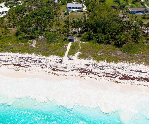 Welcome to Wish House!  Aerial of Wish House from the beach.