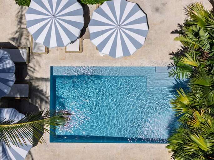 Our heated pool and natural stone pool deck.