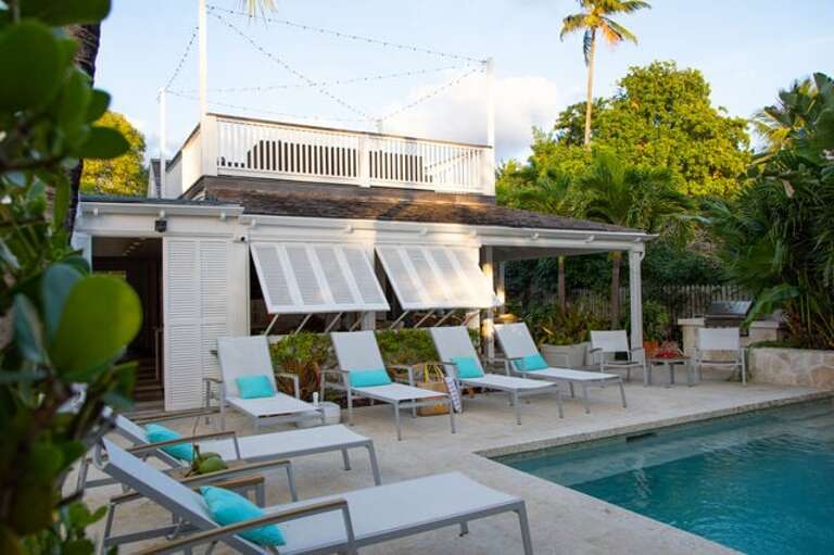 Our heated pool and natural stone pool deck. Our heated pool and natural stone pool deck.