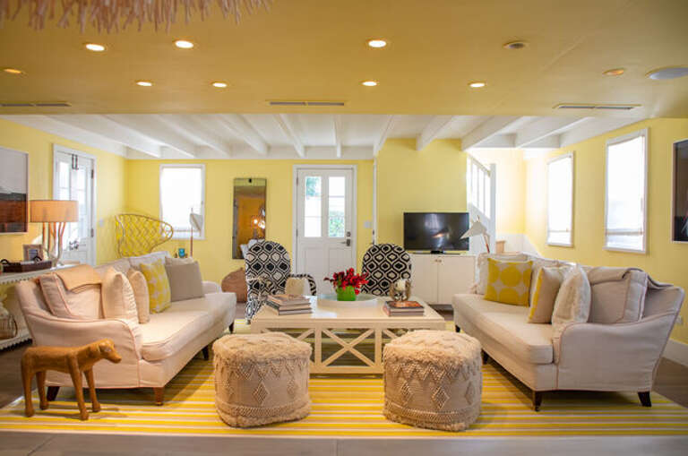 Living Area tastefully decorated with custom furniture and artwork