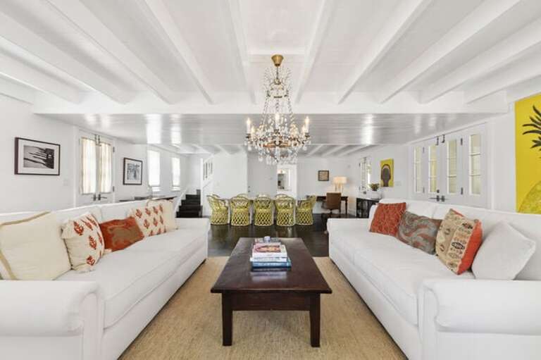 Living Area tastefully decorated with custom furniture and artwork
