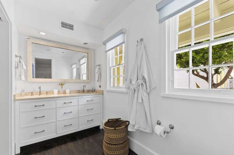 Master bathroom with double sink and shower.