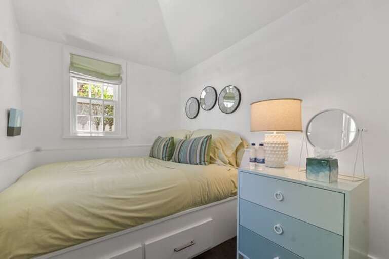 Second of two Pool House bedrooms, with a full bed and shared bath.