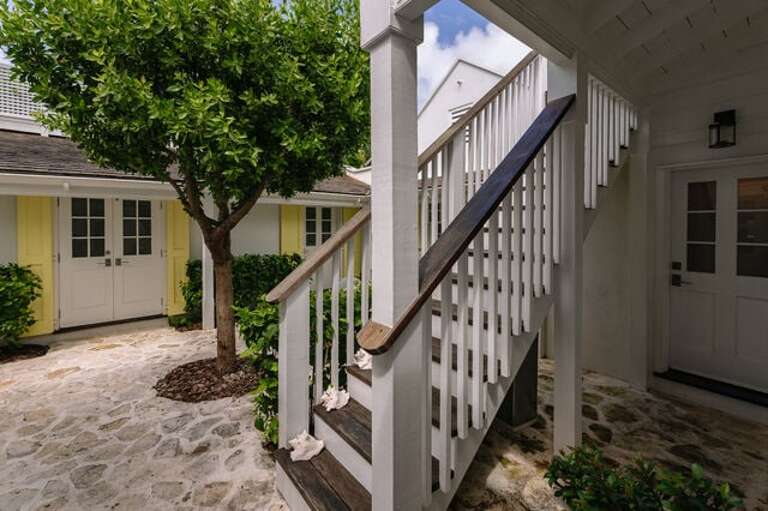 Stairs to roof top living area.