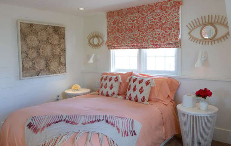 Upstairs bedroom with queen bed, en-suite bathroom and private balcony.