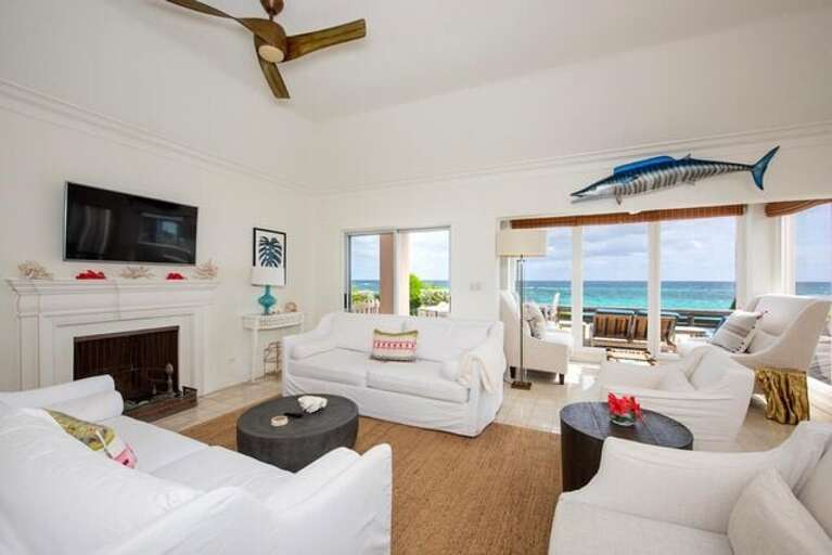 Great Room with ocean views with comfortable seating and a large flat-screen TV, Great Room with ocean views with comfortable seating and a large flat-screen TV,