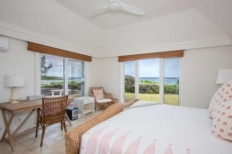 Guest bedroom with king size bed features its own private bathroom. Guest bedroom with king size bed features its own private bathroom.