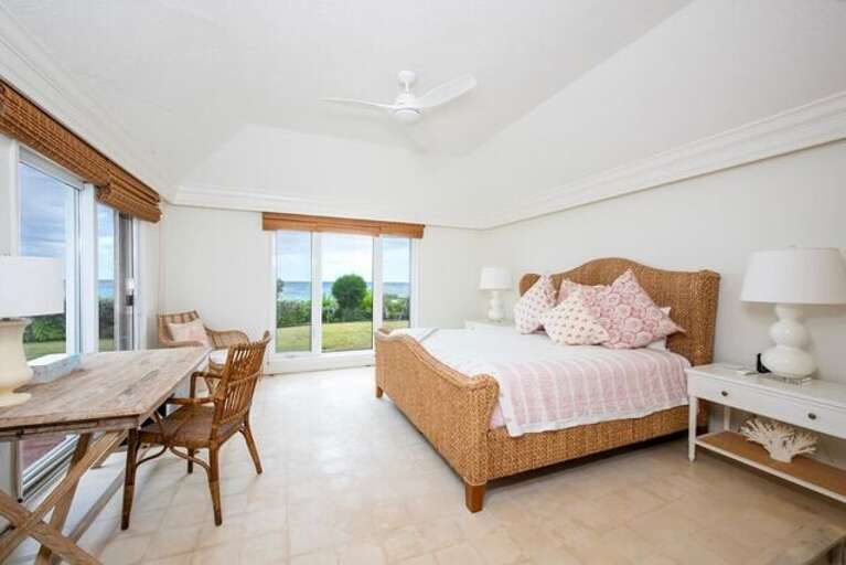 Master bedroom with king size bed is elegantly appointed and features its own private bathroom. Master bedroom with king size bed is elegantly appointed and features its own private bathroom.